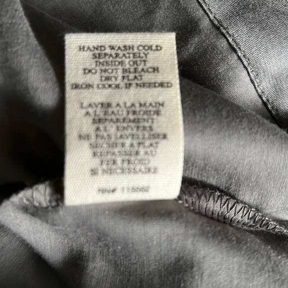 Steve Madden short sleeve gray blouse with decorative button up back. - Picture 6 of 7